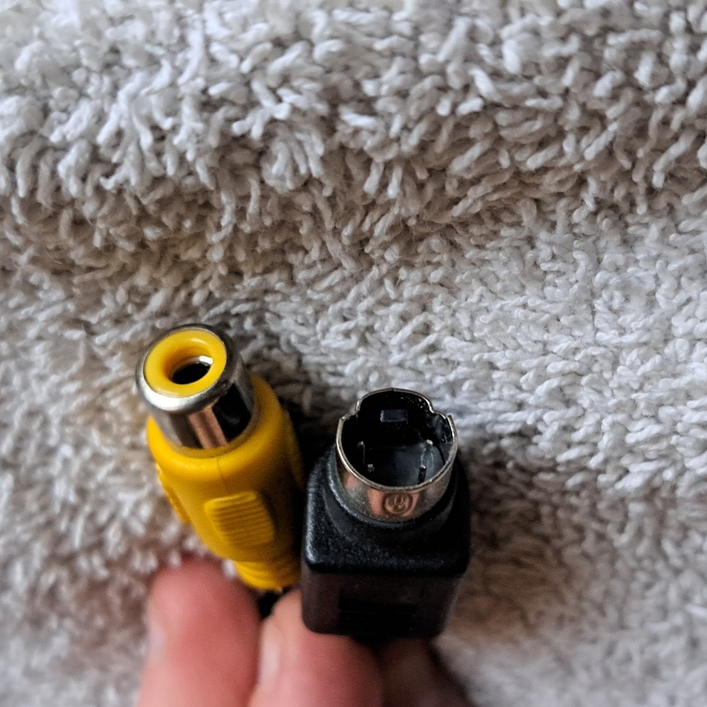 Yellow and Black Video Game Console Cables